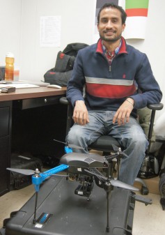 Photo of Singh and the sUAS: Daljit Singh, K-State doctoral student in plant pathology, is studying how small unmanned aerial systems, or drones, can help wheat researchers identify higher yielding, more heat and drought tolerant wheat lines faster. 