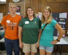 Anita DeWeese (center) and her now-teenage children – Jarod (left) and Jessica (right) – have attended the Kansas 4-H Wheat Expo for nearly 10 years.