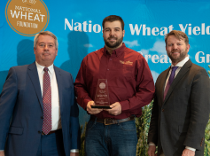 Alec Horton receives award in the National Wheat Yield Contest.