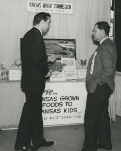 Bob Dole visiting the Kansas Wheat Commission booth at the Kansas State Fair. Photo courtesy of the Robert J.Dole Institute of Politics. 
