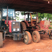 Photo: New and old tractors at a farm in Cuba.