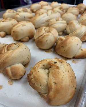 Photo: Garlic knots made from local flour.