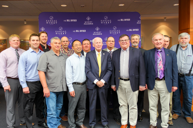 Photo: Kansas Wheat board members with Coach Snyder.
