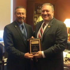 Gary Millershaski, Lakin, Kan., presents Congressman Mike Pompeo (KS) with the NAWG Wheat Advocate Award. Congressman Pompeo has led the charge in Washington D.C. for an industry-supported GM-Labeling bill.
