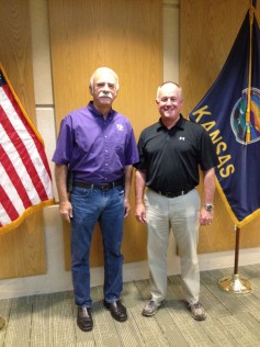 Photo: Adrian Polansky (left) and Val Dolcini (right) tour the Kansas Wheat Innovation Center.