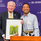Photo: Coach Bill Snyder and Wheat Breeder Guorong Zhang.
